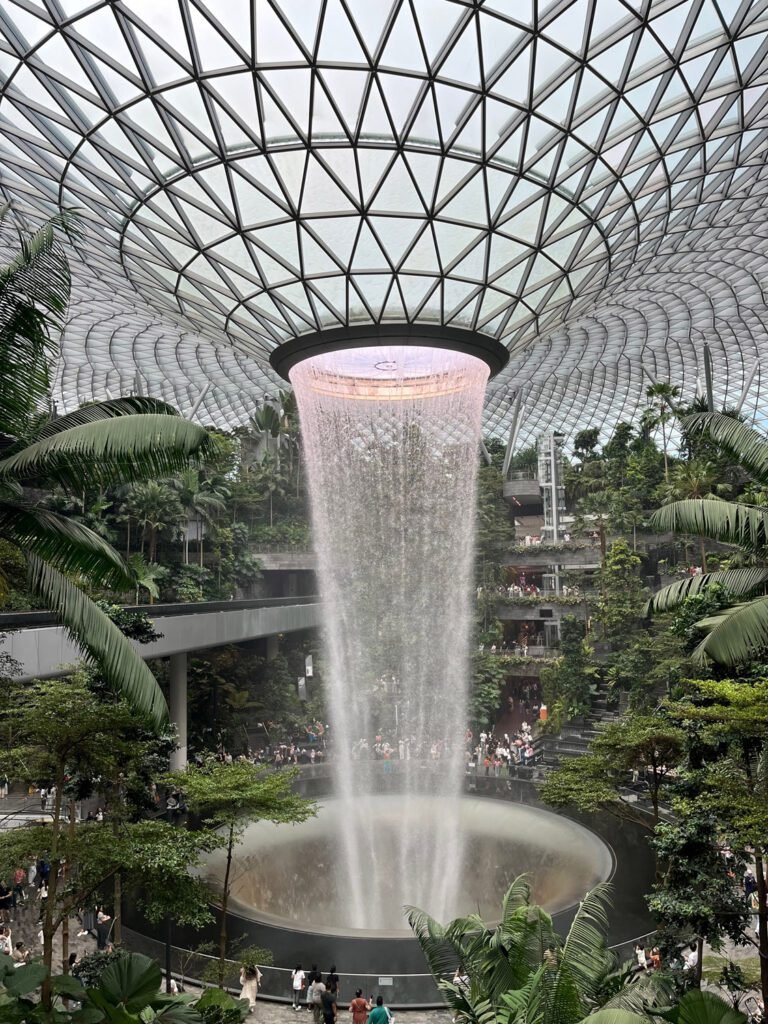 The extraordinary and beautiful waterfall at Jewel, Changi Airport. Water cascades 40 metres from the jewel-inspired roof.